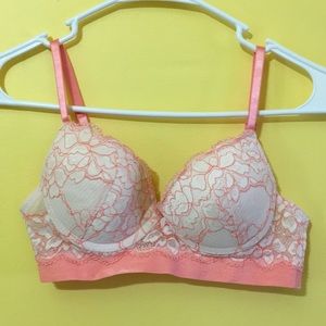 Fluorescent orange bra and beige bra.